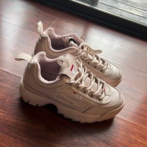 These a size 6 (women) light pink filas. Have been worn but in good condition.